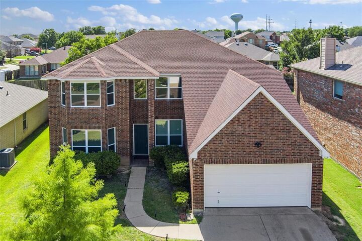 Property Photo:  7000 Snowy Owl Street  TX 76002