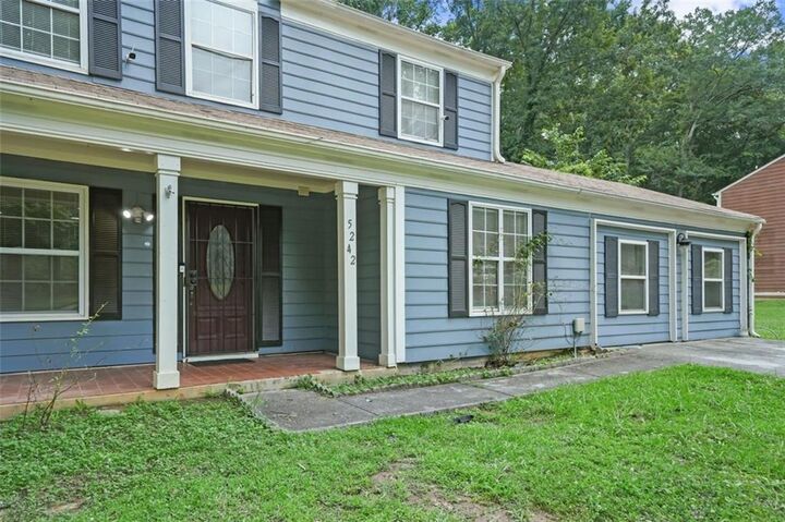 Property Photo:  5242 McCarter Station  GA 30088 
