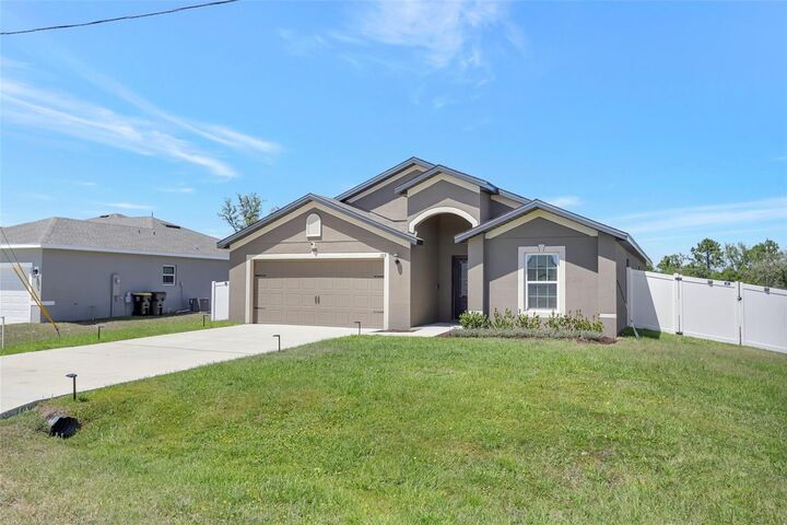 Property Photo:  329 W Aster Court  FL 34759 
