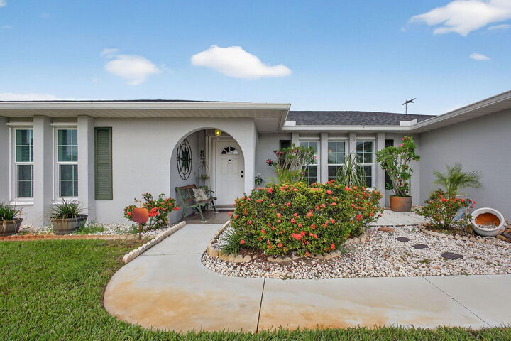 Property Photo:  2477 SW Chestnut Lane  FL 34953