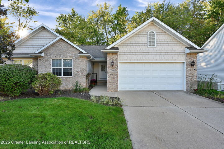 Property Photo: 1521 Nottingham Forest Trail MI 48895