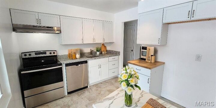 Property Photo:  9815 Portage Drive  MO 63136 