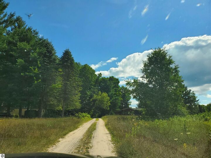 Property Photo:  1167 S Taxiway Hotel  MI 49651 