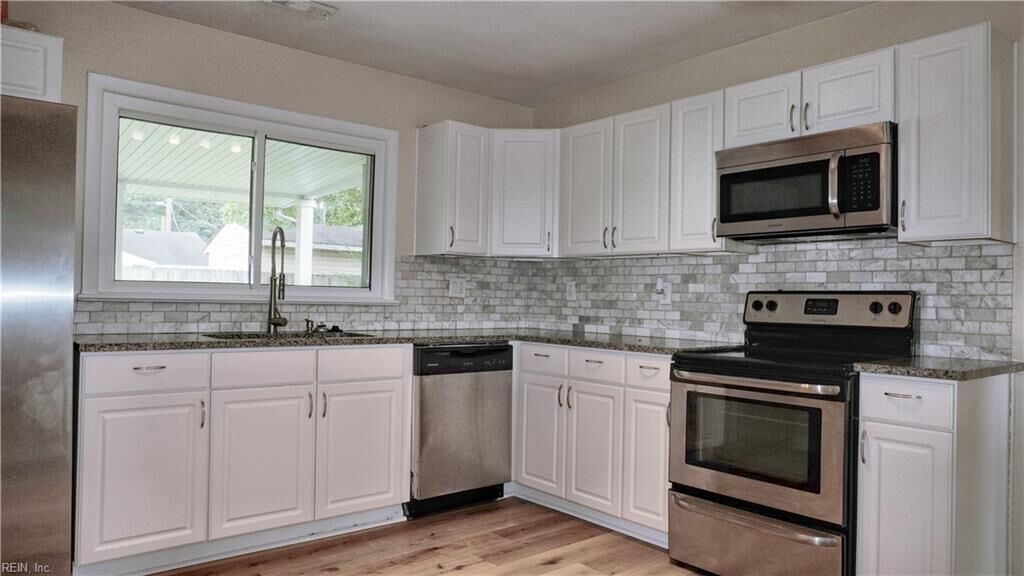 Property Photo: 3401 Woodsman Ln VA 23452