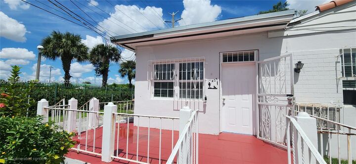 Property Photo: 405 NW 64th St FL 33150