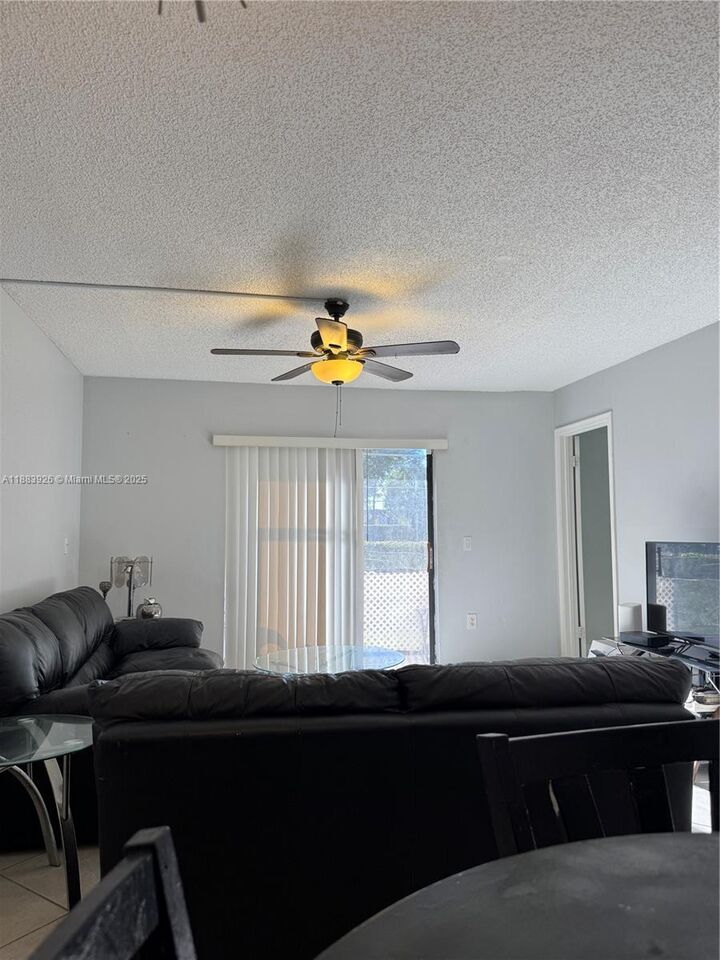Property Photo: 142 NW 91st Ave 104 FL 33024