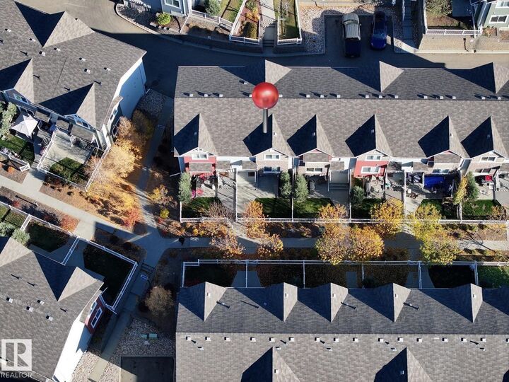 Property Photo: 655 Tamarack Road NW 103 AB T6T 0N4