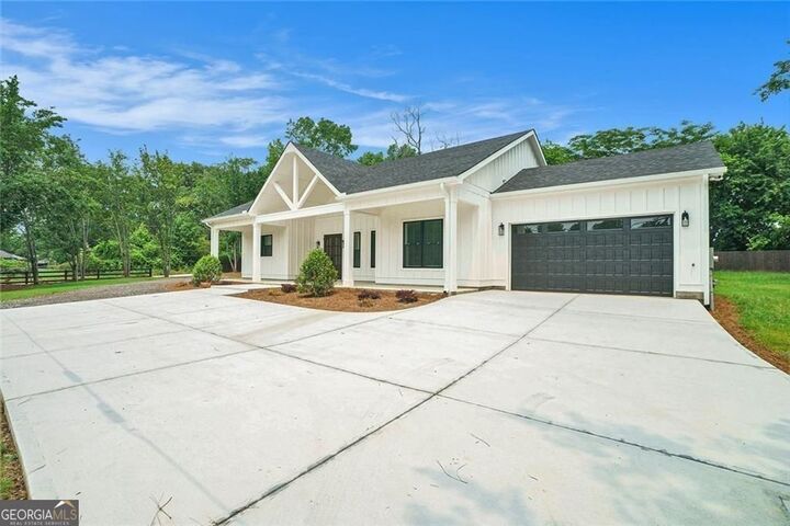 Property Photo:  4824 SE Highway 20  GA 30013 