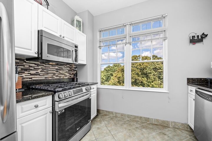 Property Photo:  614 Pond St 1405  MA 02184 
