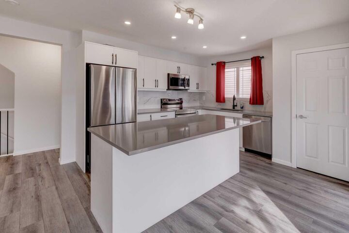 Property Photo:  827 Windbury Street SW  AB T4B 3T1 