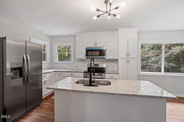 Property Photo:  213 Pineland Avenue  NC 27520 
