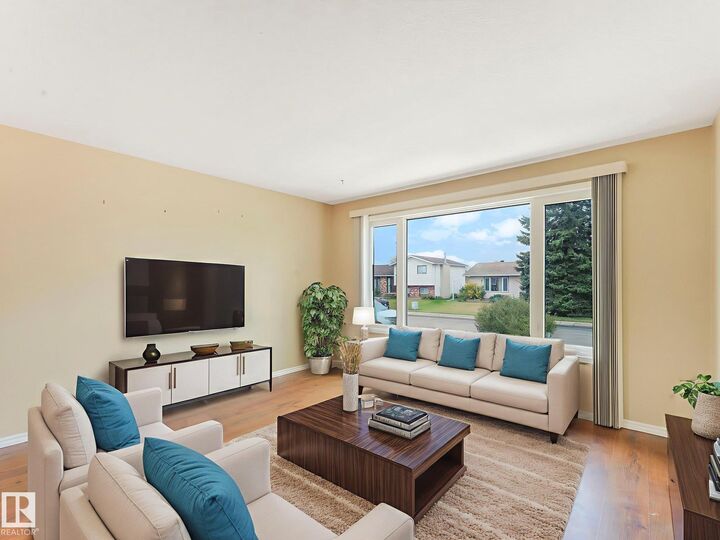 Property Photo:  13547 24 Street NW  AB T5A 3S7