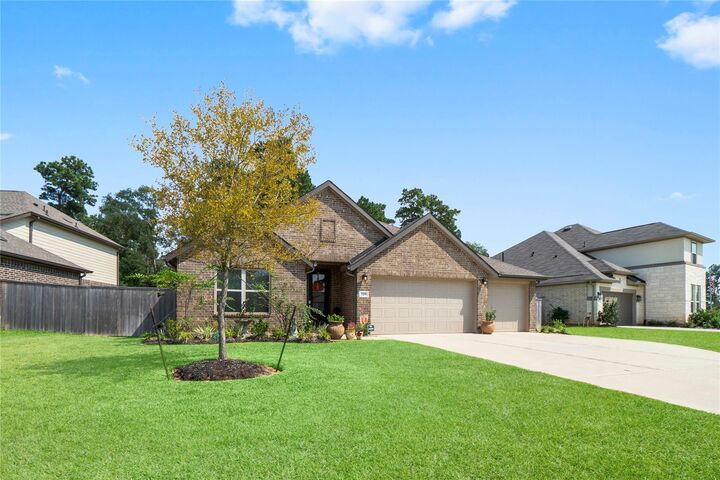 Property Photo: 725 Ivory Creek Court TX 77378