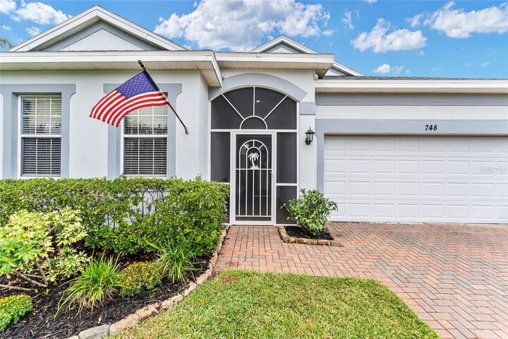 Property Photo:  748 Summit Greens Boulevard  FL 34711 