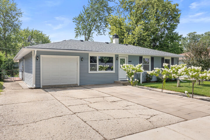 Property Photo:  6640 Peach Tree Street  IL 60133 