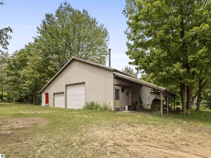 Property Photo:  8536 E 5 Mile Road  MI 49656