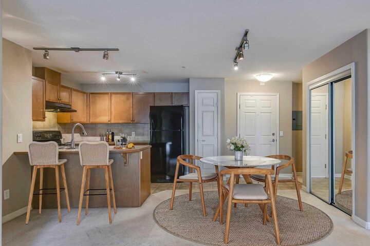 Property Photo: 92 Crystal Shores Road 2114 AB T1S 2M9