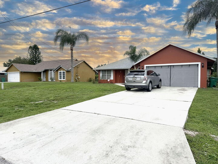 Property Photo:  2402-2408 SW Monterrey Lane  FL 34953