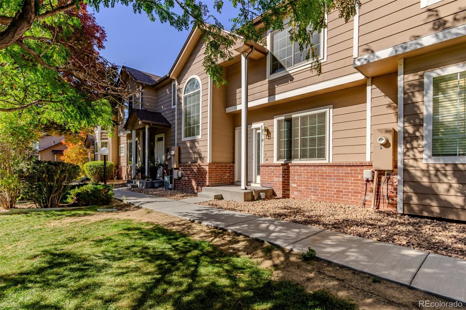 Property Photo:  6815 S Webster Street F  CO 80128 