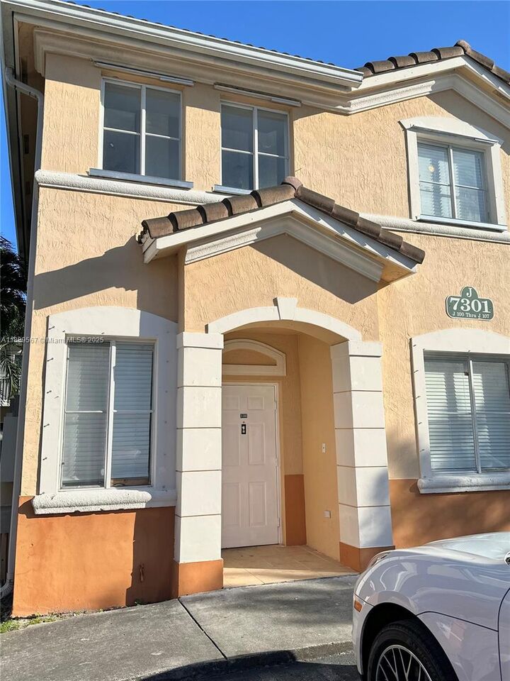 Property Photo: 7301 NW 174th Ter 100 FL 33015