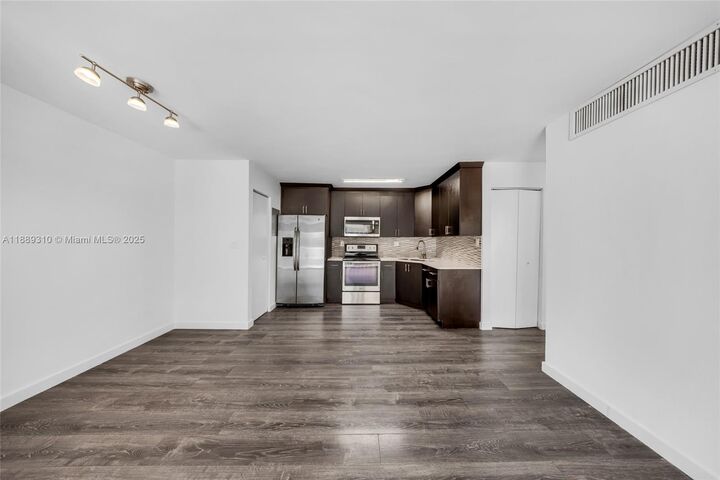 Property Photo:  4480 NW 79th Ave 2G  FL 33166 
