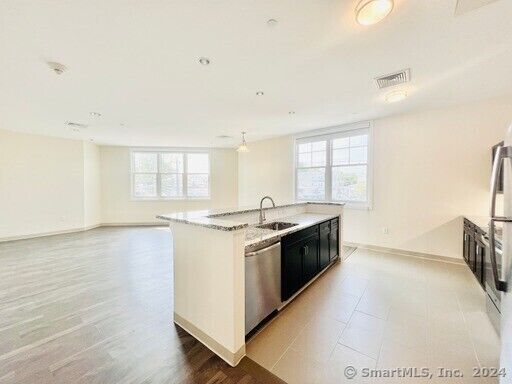 Property Photo: 215 Stillwater Avenue 319 CT 06902