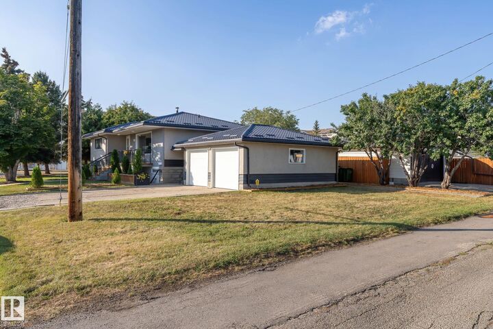 Property Photo:  12410 134 Avenue NW  AB T5J 3Y4 