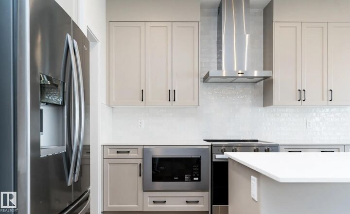 Property Photo: 3218 Dixon Way SW AB T6W 5L3