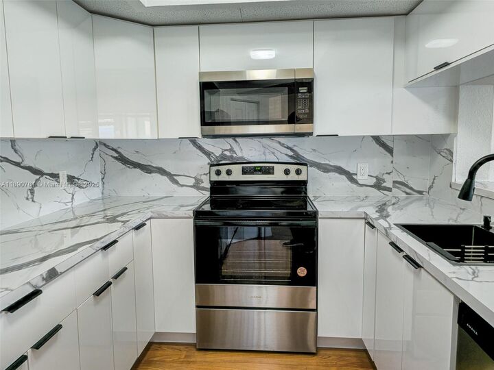 Property Photo: 12500 SW 5th Ct 412M FL 33027
