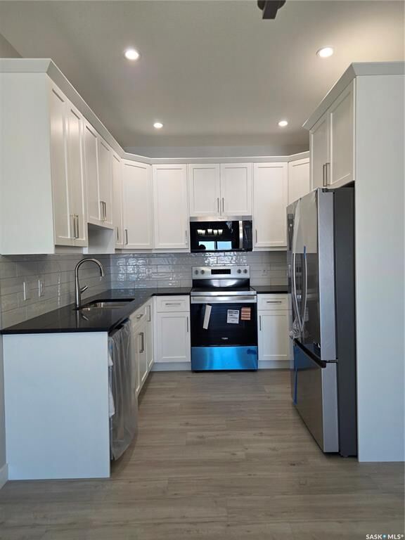 Property Photo:  846 Delaet Bay  SK S0K 0A1 