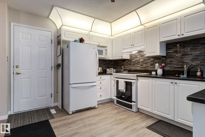 Property Photo: 201 Bothwell Drive 22 AB T8H 2C8