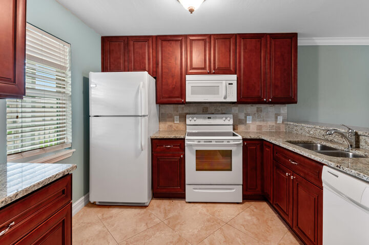 Property Photo:  829 W Elkcam Circle 208  FL 34145 