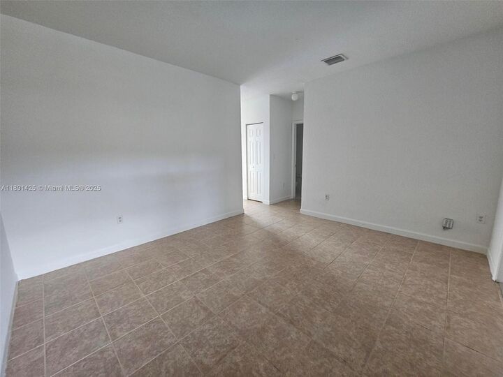 Property Photo:  1005 NE 42nd Ave  FL 33033 