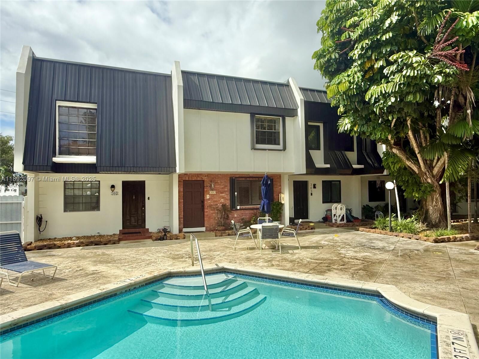 Property Photo:  5555 Ludlam Rd 47  FL 33155 