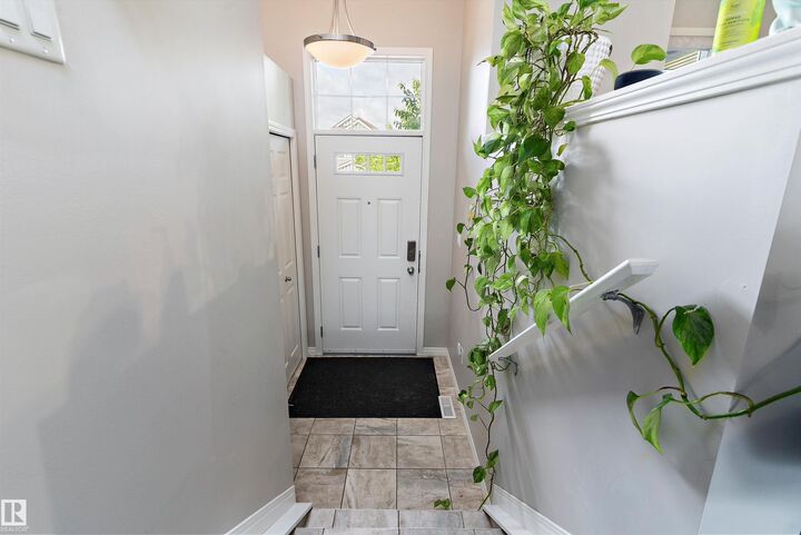 Property Photo: 4019 Orchards Drive SW AB T6C 1V2