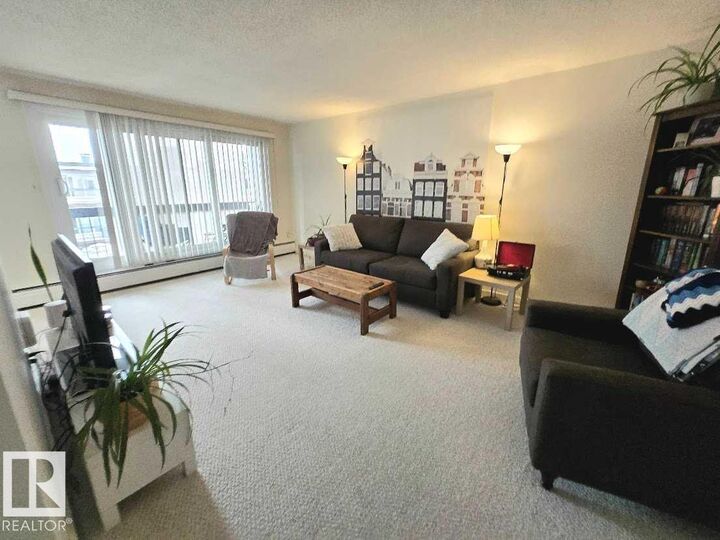 Property Photo: 11455 41 Avenue NW 305 AB T6J 0T9
