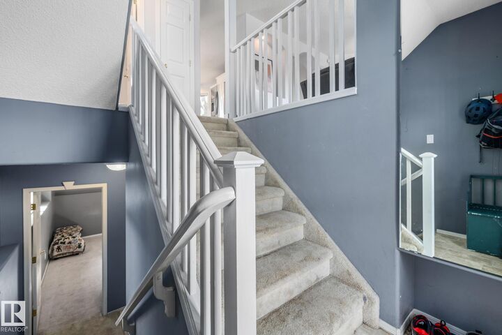 Property Photo: 1237 Carter Crest Road NW 23 AB T6R 2R2