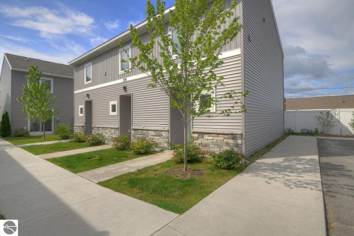 Property Photo:  1139 E Eighth Street 7  MI 49686 