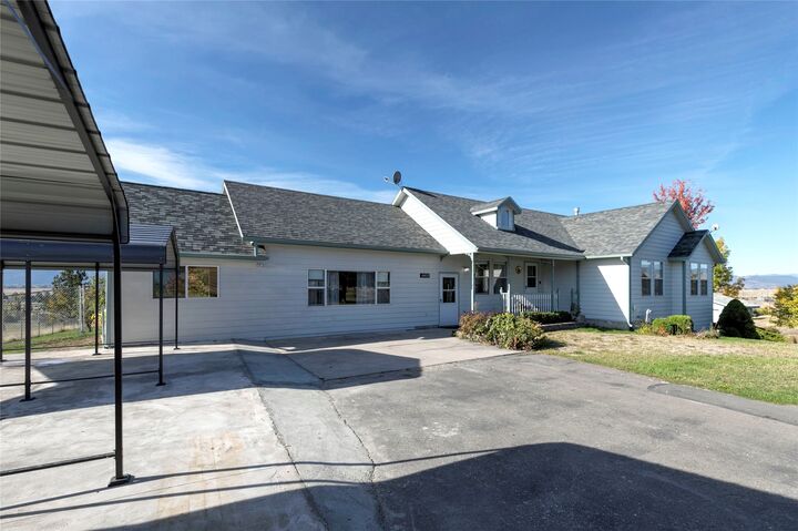 Property Photo:  6601 Goodan Lane  MT 59808