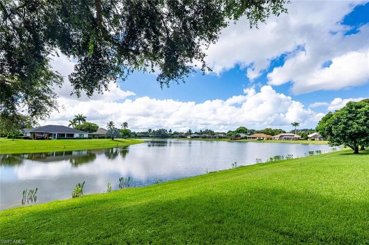 Property Photo: 9974 Boca Ave N FL 34109