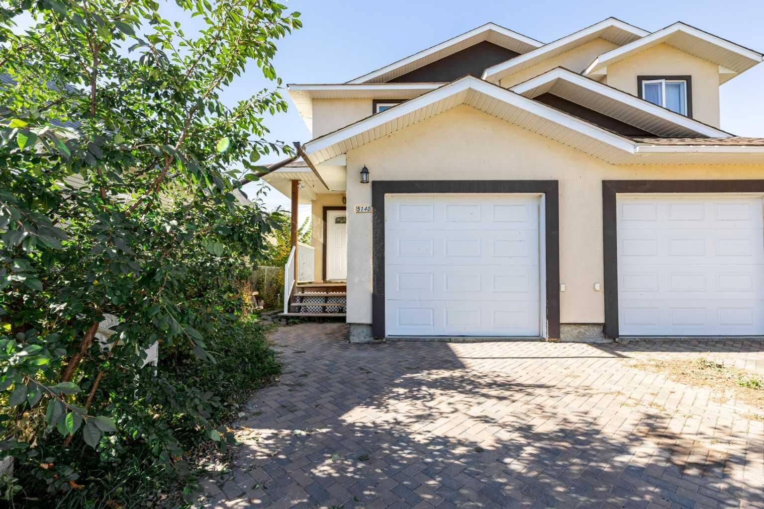 Property Photo: 5140 51 Street AB T4L 1H9