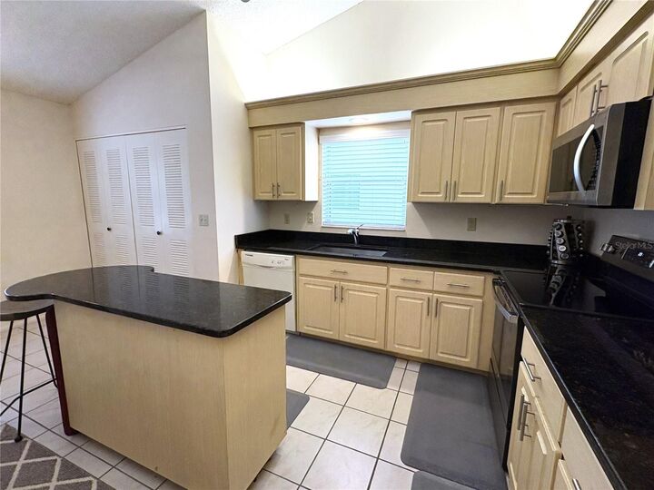 Property Photo: 4933 Village Gardens Drive 211 FL 34234