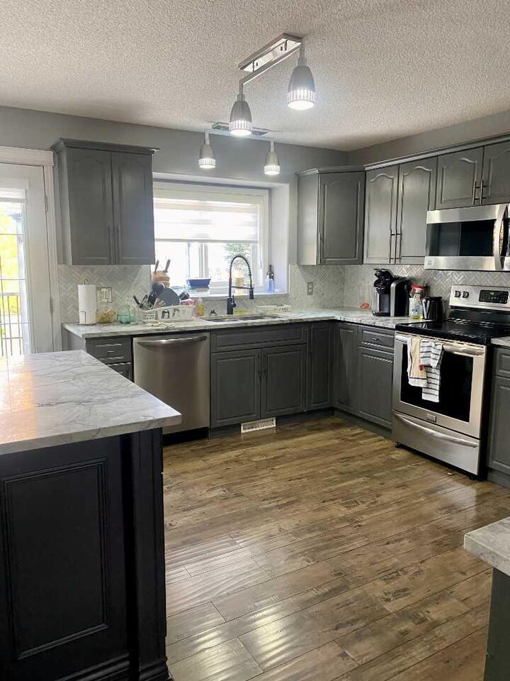 Property Photo: 205 Smallwood Street AB T9K 2J7