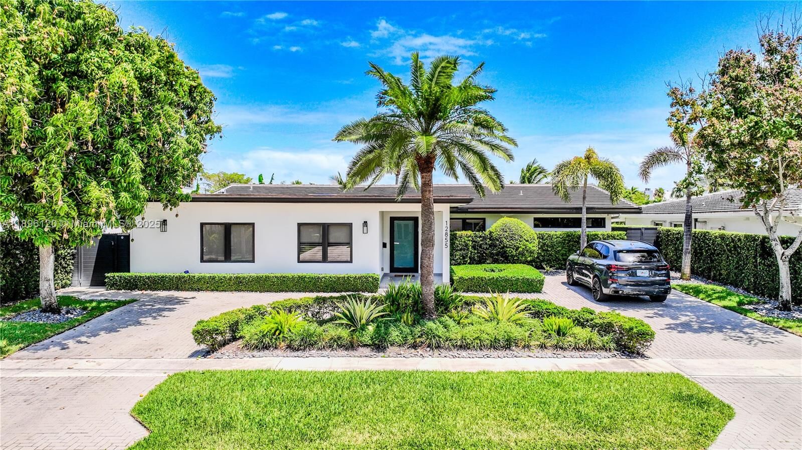 Property Photo: 12855 Maple Rd FL 33181
