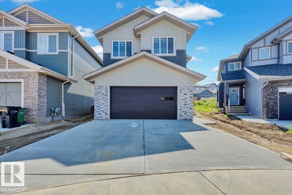 Property Photo: 1119 Gyrfalcon Crescent NW AB T5S 0S5