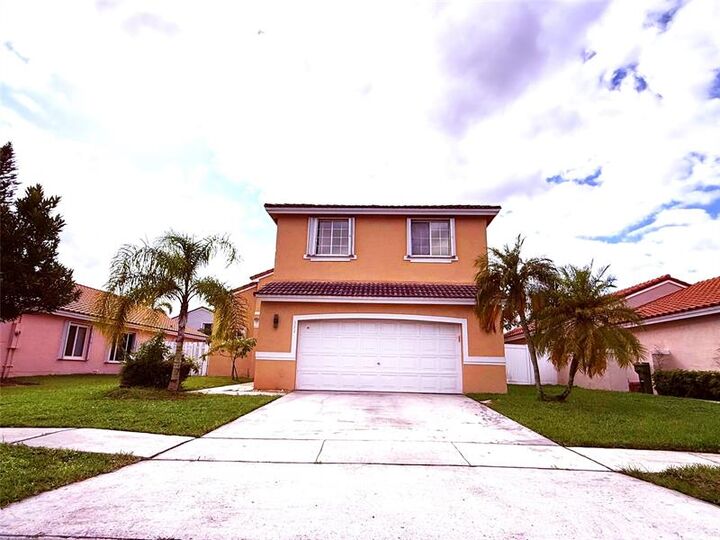 Property Photo:  322 SW 193rd Ave  FL 33029