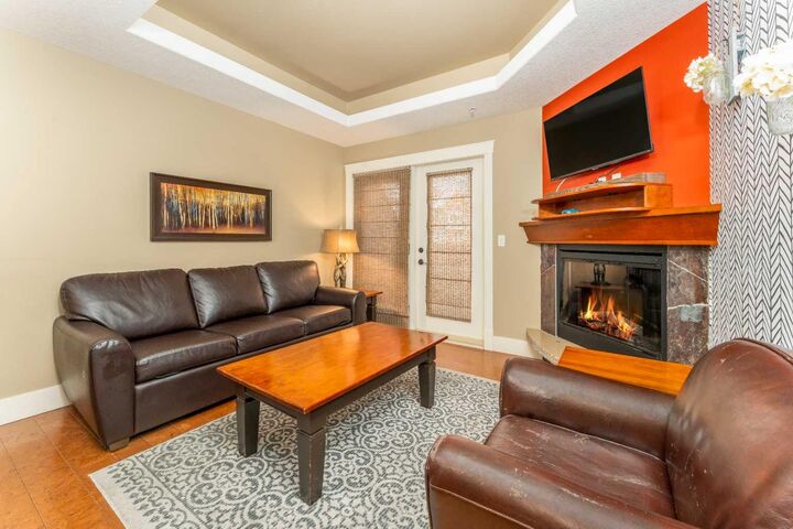 Property Photo: 173 Kananaskis Way 323 AB T1W 0A3