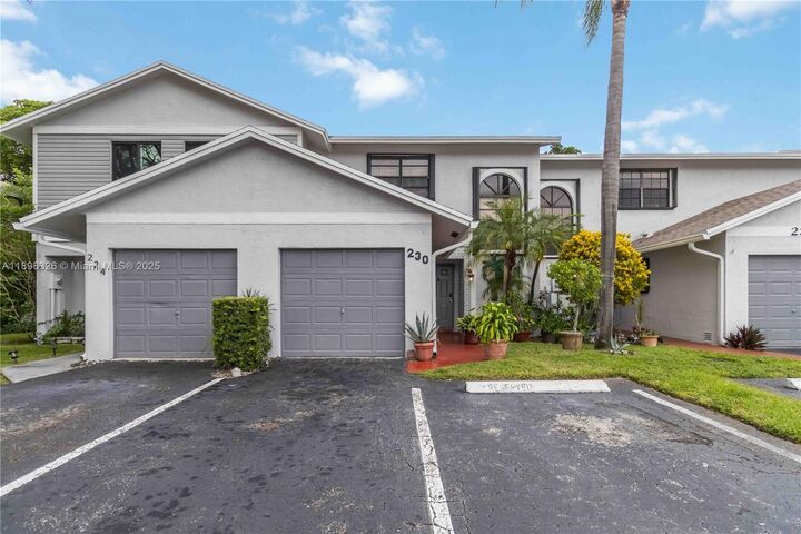 Property Photo:  230 NW 106th Ter  FL 33026