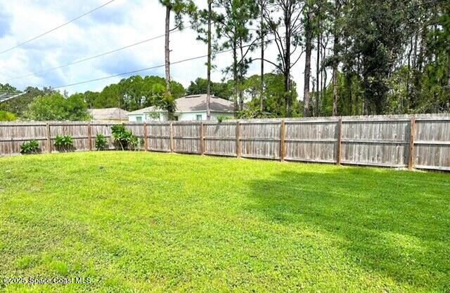 Property Photo: 141 SE Ensenada Street SE FL 32909