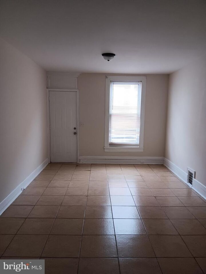 Property Photo: 117 N Glover Street MD 21224